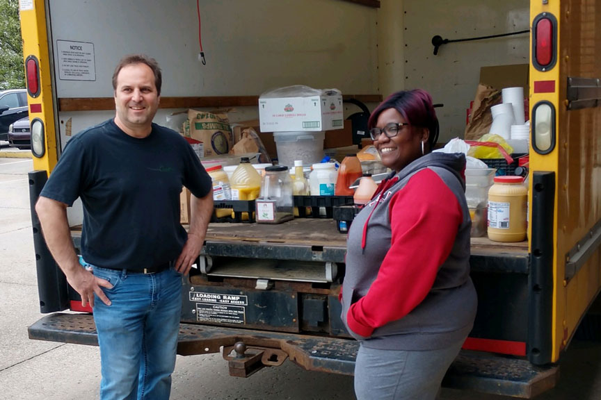 At MillCos Hospitality and Cosentino Restaurants, we feel it's important to give back to our community. In mid May, we donated $4,000 in perishable and non-perishable food items to Kent Social Services. Marquice Seward, Program Manager helped Dave Cosentino, Chef and Owner/Operator at MillCos Hospitality Group, LLC. with unloading the truck.